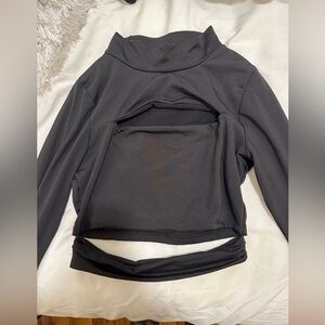 Long sleeve cropped shirt with cut outs on chest and stomach